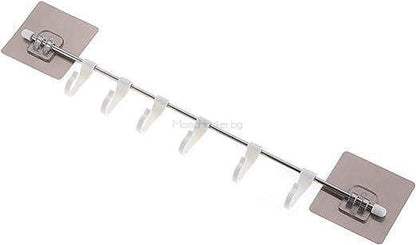 Държач за прибори ToolHanger - универсален органайзер с лепящи куки за кухня и баня, практична организация на дома.