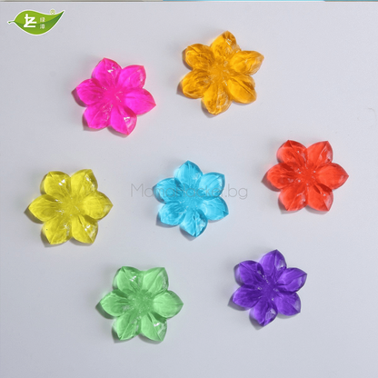 Цветни декоративни цветя от пластмаса - жълти, оранжеви, розови, зелени, сини, лилави. Аксесоари за дома на ниски цени.