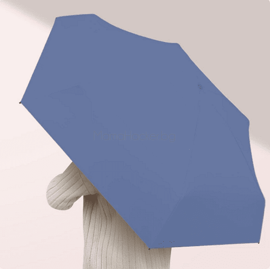 Компактен преносим чадър RainBlock в син цвят, идеален за пътуване с UV защита | Поръчай от MamaHacker.bg