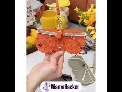 Кожен калъф за очила GlassesGuard в оранжев цвят, стилен и практичен аксесоар за всеки модерен потребител.