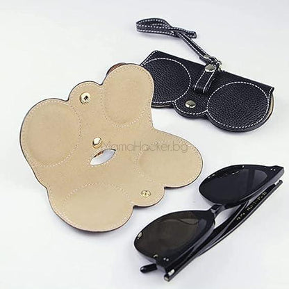 Кожен калъф за очила GlassesGuard в черен и светъл цвят, стилен и практичен, идеален за празнични подаръци на ниски цени.